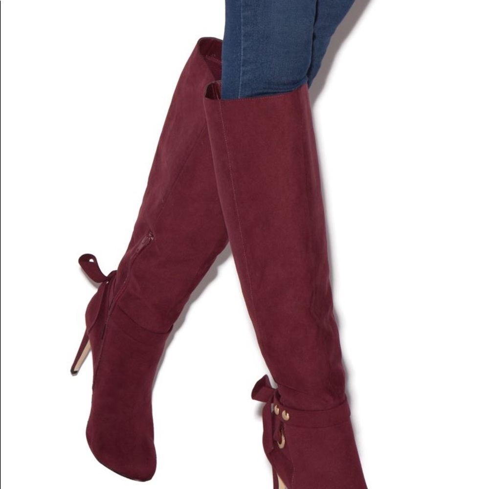 Knee high heeled boots